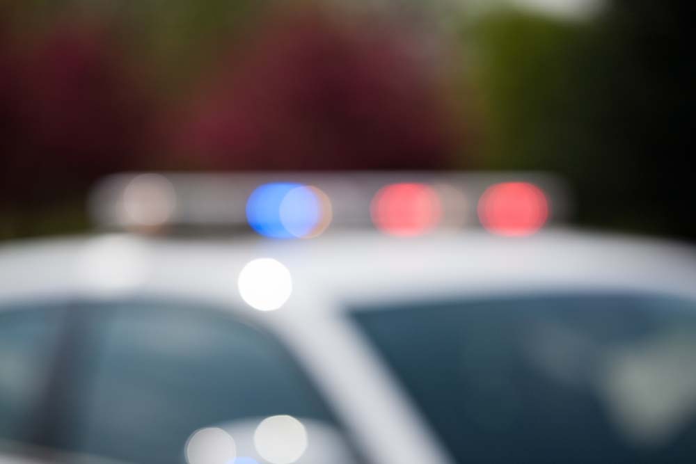 Photo of the lights on a police cruiser.